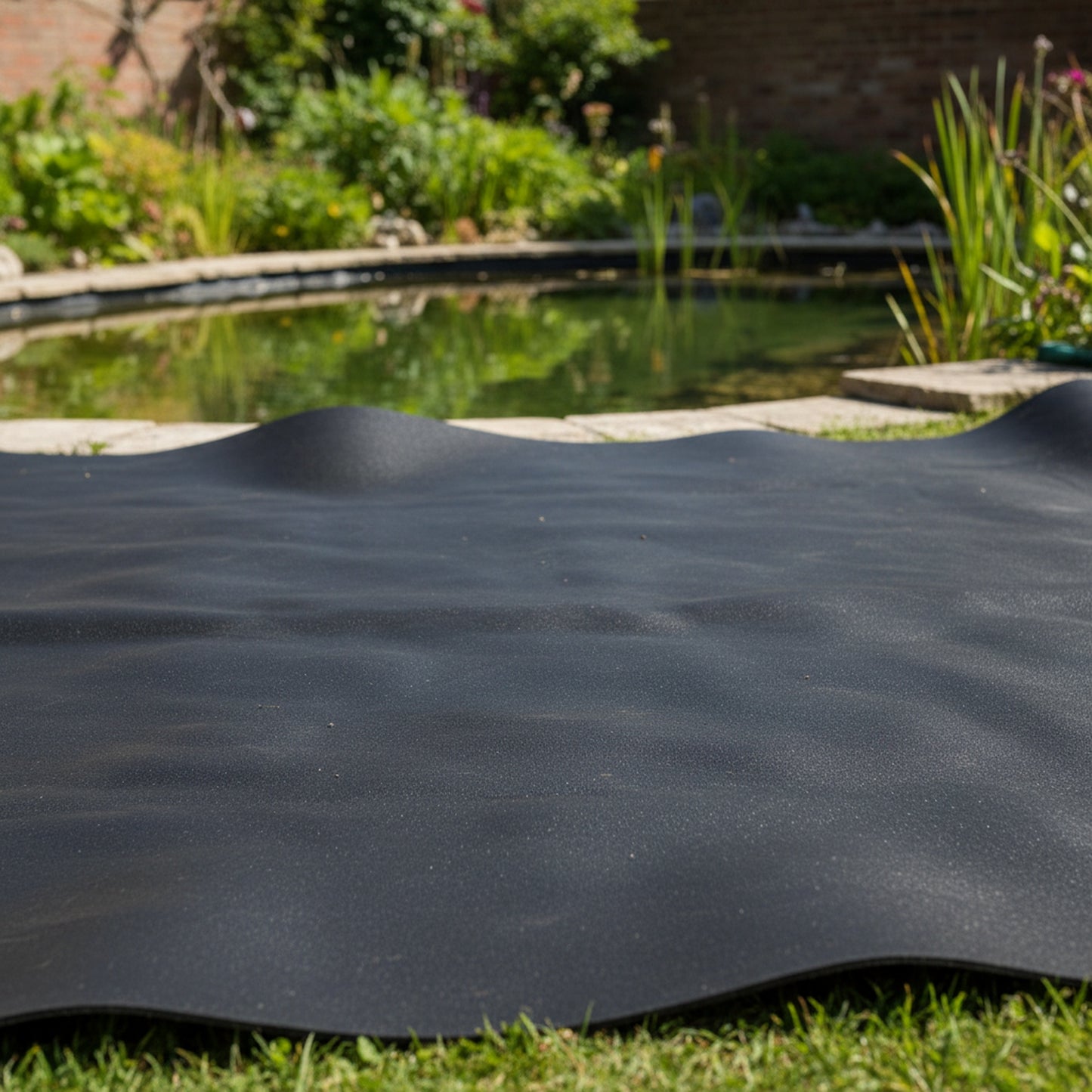 Heavy duty EPDM pond liner surface texture with natural swimming pond UK