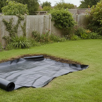 Flexible LDPE pond liner being installed in UK garden