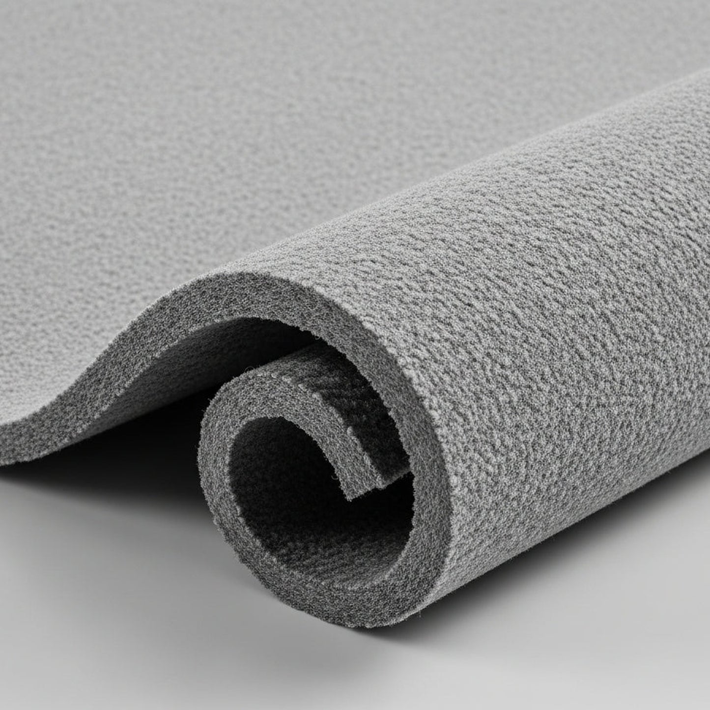 Close-up of 200gsm geotextile pond liner underlay showing thick fleece texture