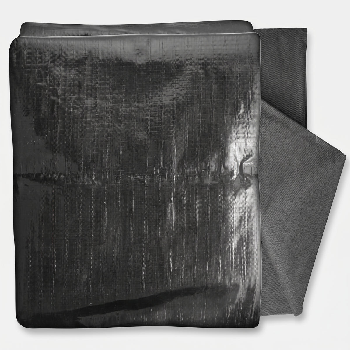 Folded black HDPE pond liner with its dark grey protective underlay