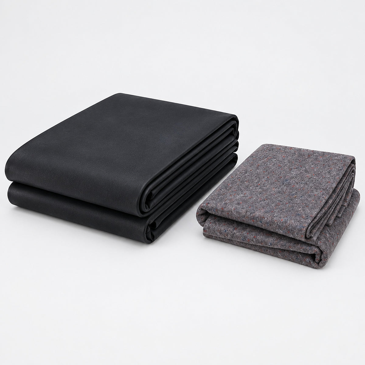Koi pond liner kit: folded 1.0mm black EPDM rubber liner beside folded grey 200gsm geotextile underlay