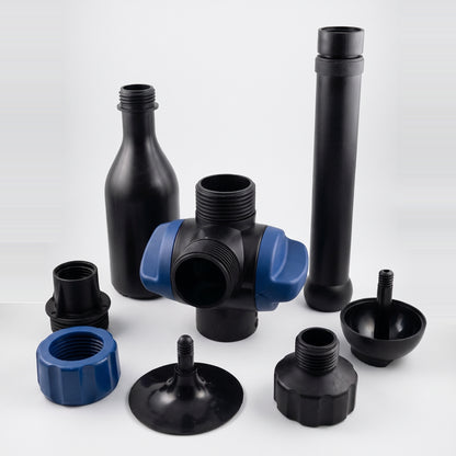 Pond fountain nozzle kit parts on a white background: foaming jet nozzle, telescopic riser, T-piece with two blue flow valves, hose tail, nut, adapter, domed and flat disc heads