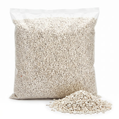 Bag of natural zeolite ammonia remover granules with a small heap of loose granules on a white background